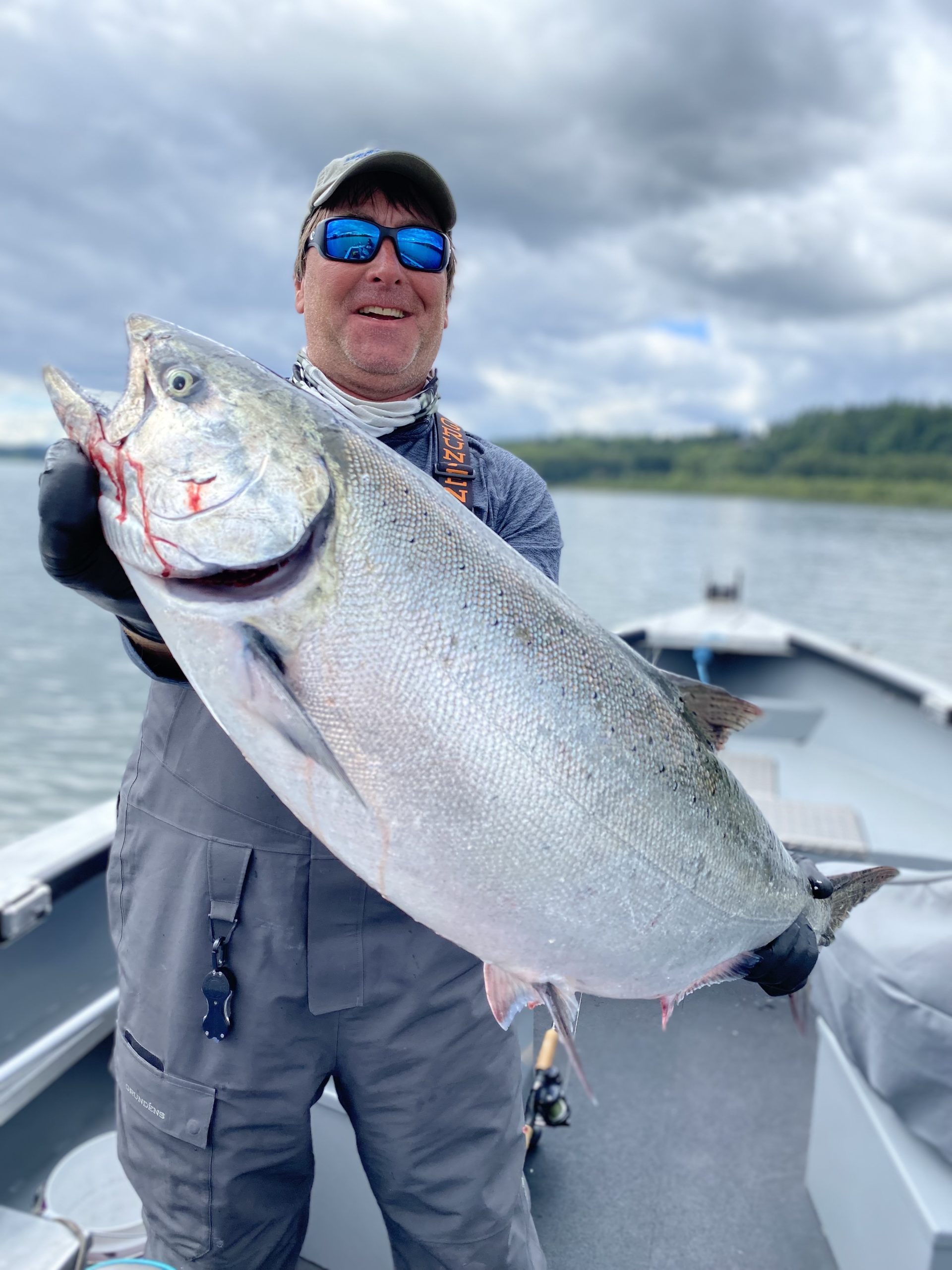 Oregon Spring Chinook, Book a Guided Fishing Trip, man holding fish